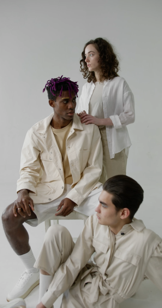 YUUGA editorial group portrait in soft neutral tailoring