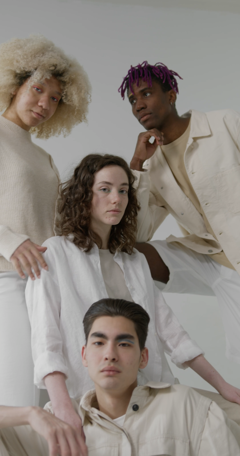 YUUGA campaign portrait with layered cream and taupe looks